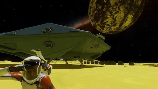 An Elite Dangerous exploration screenshot from a yellow planet with a selfie-taking player in the foreground in front of his ship and another planet